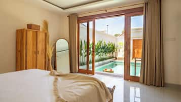 2 makuuhuonetta, tallelokero huoneessa, työpöytä, silitysrauta/-lauta