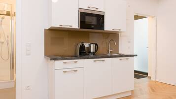Apartment | Private kitchen | Full-size fridge, microwave, stovetop, espresso maker