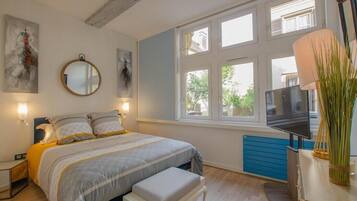 1 slaapkamer, een strijkplank/strijkijzer, gratis wifi, beddengoed