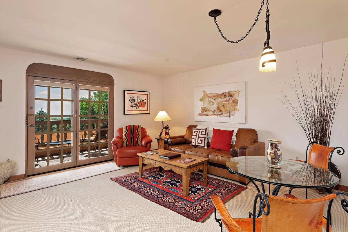 1 Bedroom Penthouse 312 | Living room | 30-inch flat-screen TV with cable channels, fireplace