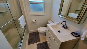 Hair dryer, towels, soap, shampoo