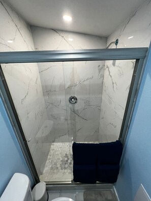 Hair dryer, towels, soap, toilet paper