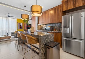 Fridge, microwave, stovetop, coffee/tea maker
