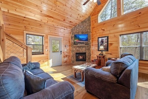 House, Multiple Beds, Hot Tub (Bobcat Lodge) | Living area | 55-inch flat-screen TV with cable channels, TV, fireplace