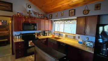 Cabin, Multiple Beds, Hot Tub (Tree La City) | Private kitchen | Fridge, microwave, oven, stovetop