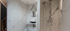 Shower, hair dryer, towels, soap