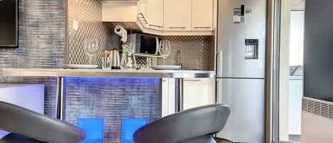 Fridge, microwave, stovetop, coffee/tea maker