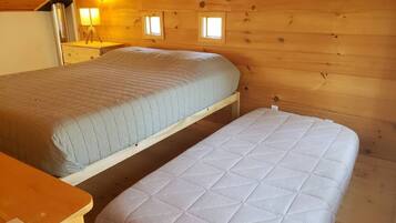 1 bedroom, desk, iron/ironing board, travel crib