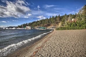 Enjoy the serene beach and forest surroundings.