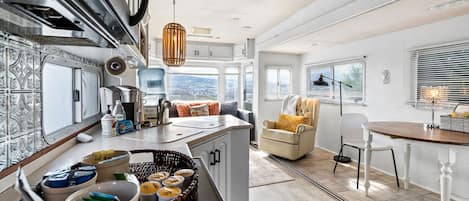 Glamp Cottage Trailer | Living area | Flat-screen TV, fireplace