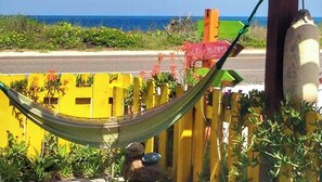 Standard Double Room, Patio, Partial Ocean View | Terrace/patio - Si Como No Inn (Flagler Beach)