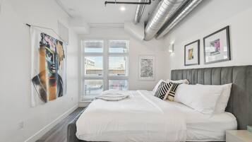 Condo, Multiple Beds, Patio, City View ((R01) 3198 Blake St. Unit 201) | 2 bedrooms, individually decorated, individually furnished, free WiFi