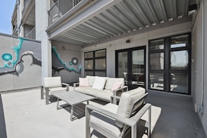 Condo, Multiple Beds, Patio, City View ((R02) 3198 Blake St. Unit 203) | Property grounds - Brushed & Bold | RiNo Art Lofts (Denver)