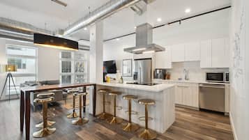 Condo, Multiple Beds, Patio, City View ((R04) 3198 Blake St. Unit 207) | Private kitchen | Fridge, microwave, oven, stovetop