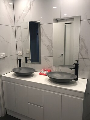Hair dryer, towels, soap, toilet paper