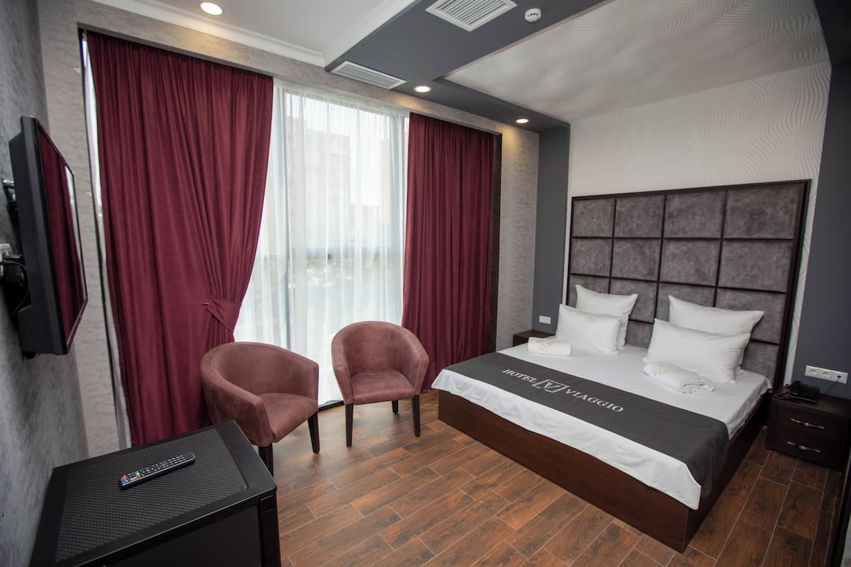 1 habitación, ropa de cama de alta calidad, cubrecamas y minibar