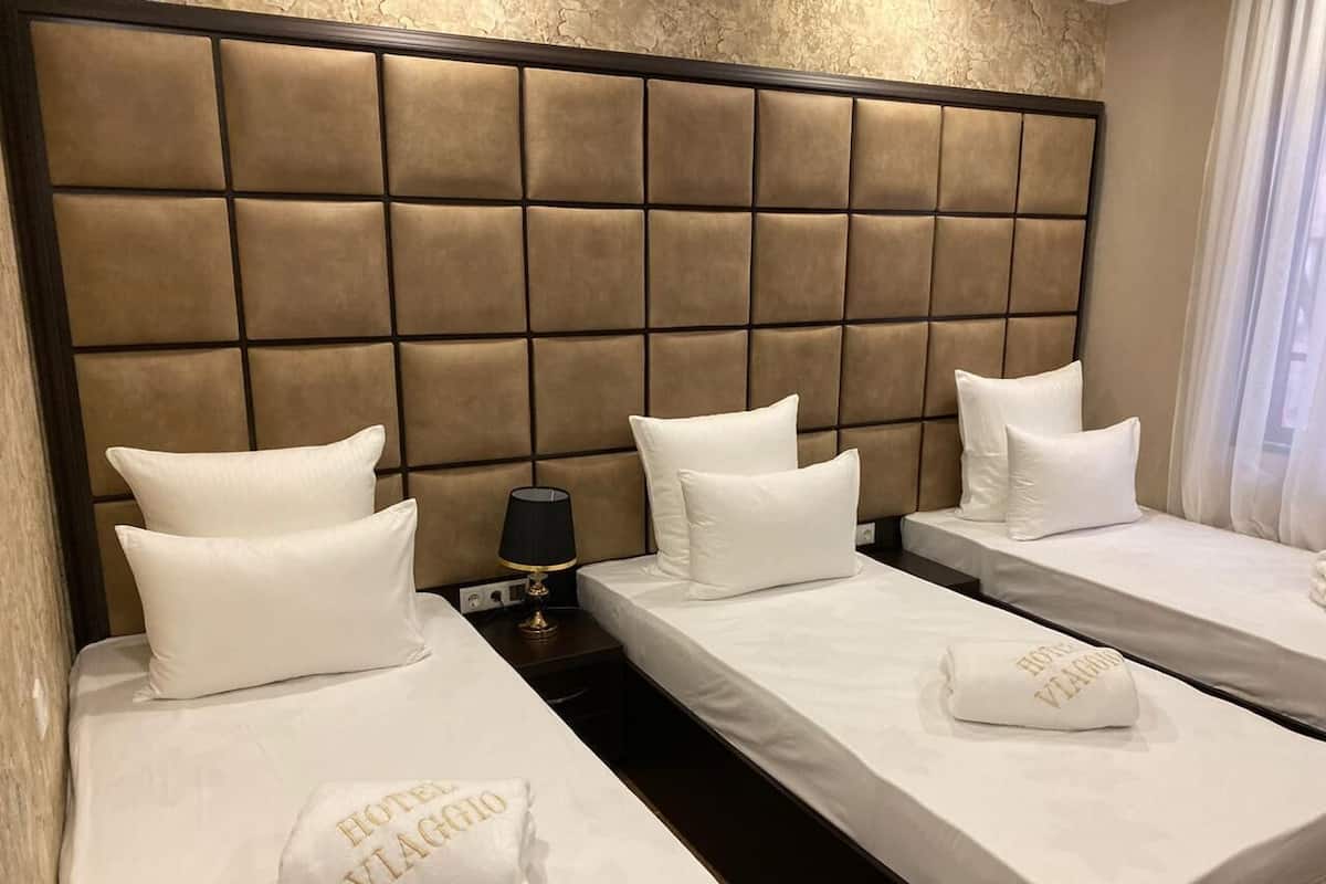 1 habitación, ropa de cama de alta calidad, cubrecamas y minibar