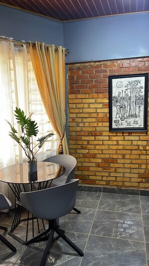 In-room dining - Cozy Bricks Apartments (Mile 11)