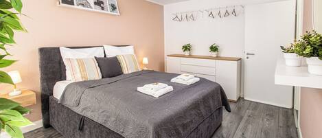 1 bedroom, desk, iron/ironing board, travel cot