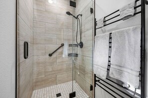 Shower, hair dryer, towels, soap