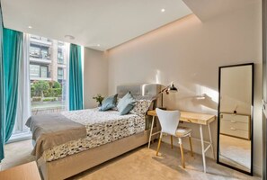 1 bedroom, desk, iron/ironing board, travel cot