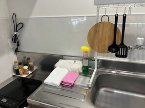 Fridge, microwave, stovetop, cookware/dishes/utensils