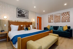 Deluxe Double Room | Desk, laptop workspace, blackout drapes, iron/ironing board