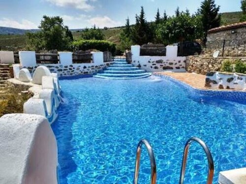 Holiday Home 'Moli Colomer' with Mountain Views, Shared Pool and Private Terrace