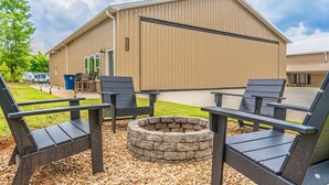 A building with a fire pit and outdoor seating. - ✈️ Full Stop Landing | Aviation Retreat Near Pinehurst (Carthage)