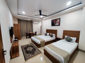 Deluxe Triple Room | Individually decorated, free WiFi, bed sheets - Happy Home Living (Guwahati)