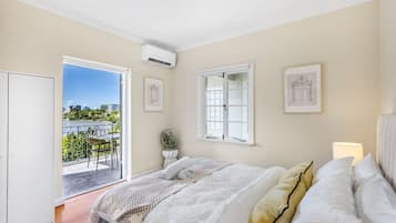 2 dormitorios, tabla de planchar con plancha, wifi y ropa de cama