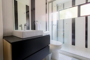 Shower, hair dryer, towels, soap