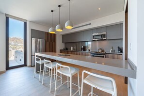 Fridge, microwave, stovetop, coffee/tea maker - Capitalia | Iconic 4BR Duplex Terrace Space Views (Cabo San Lucas)