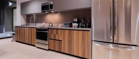 Fridge, microwave, stovetop, coffee/tea maker