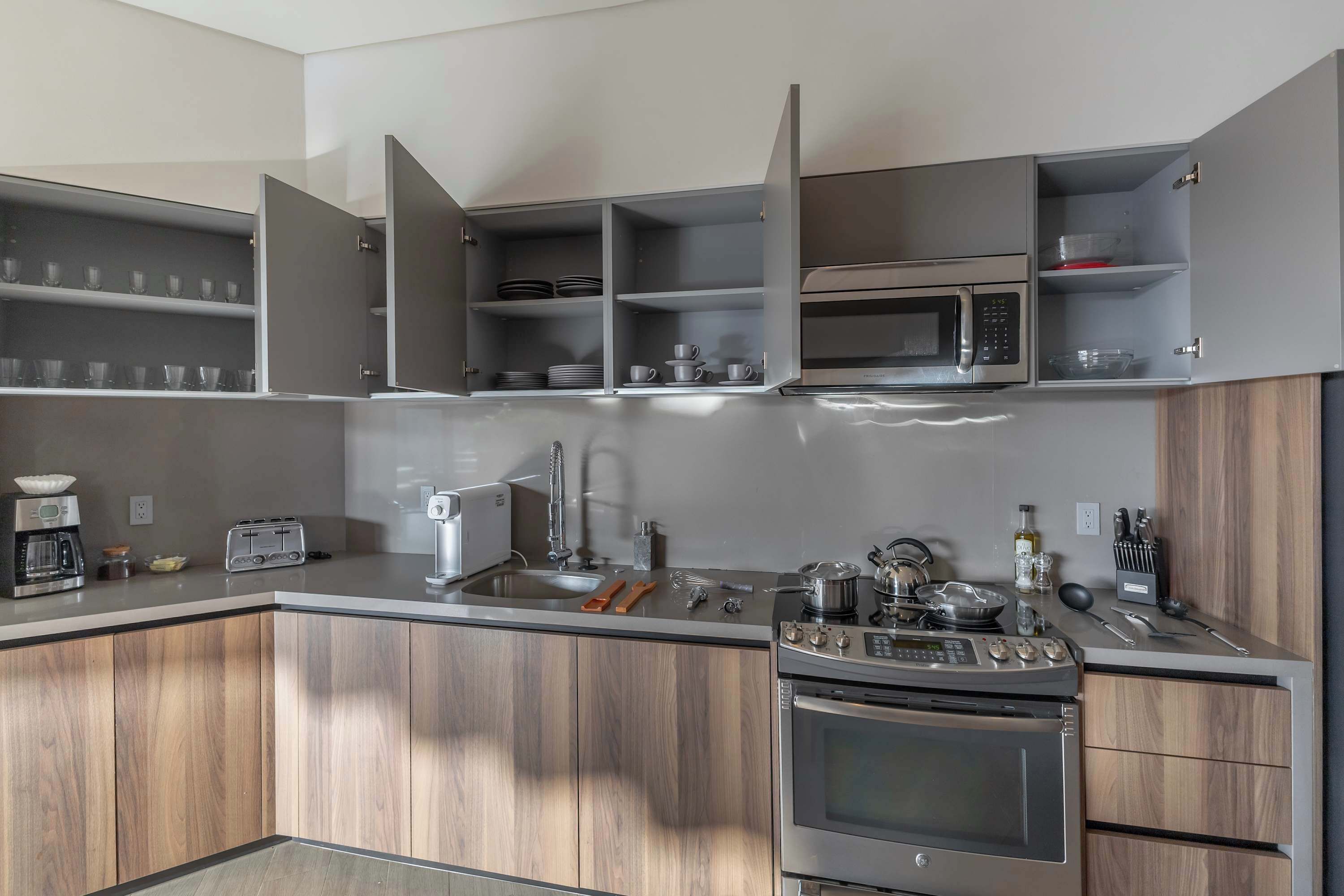Fridge, microwave, stovetop, coffee/tea maker