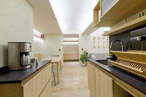 Fridge, microwave, stovetop, coffee/tea maker