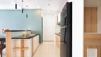 Family Apartment | Private kitchen | Fridge, microwave, cookware/dishes/utensils, cleaning supplies