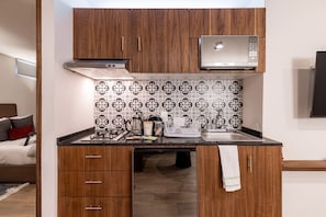 Microwave, stovetop, coffee/tea maker, toaster