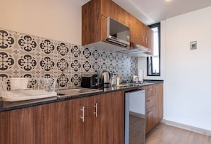 Microwave, stovetop, coffee/tea maker, toaster
