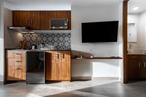 Fridge, microwave, stovetop, coffee/tea maker