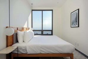 1 bedroom, desk, iron/ironing board, travel crib