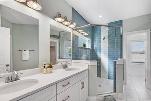 Shower, hair dryer, towels
