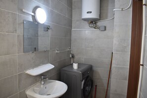 Bruser, brusehoved med spredningseffekt, bidet, håndklæder
