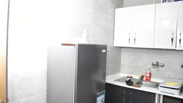 Mini-fridge, microwave, oven, coffee grinder