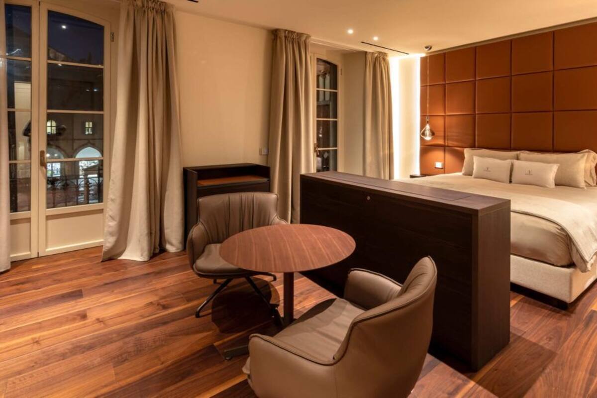Premium bedding, down comforters, pillowtop beds, minibar