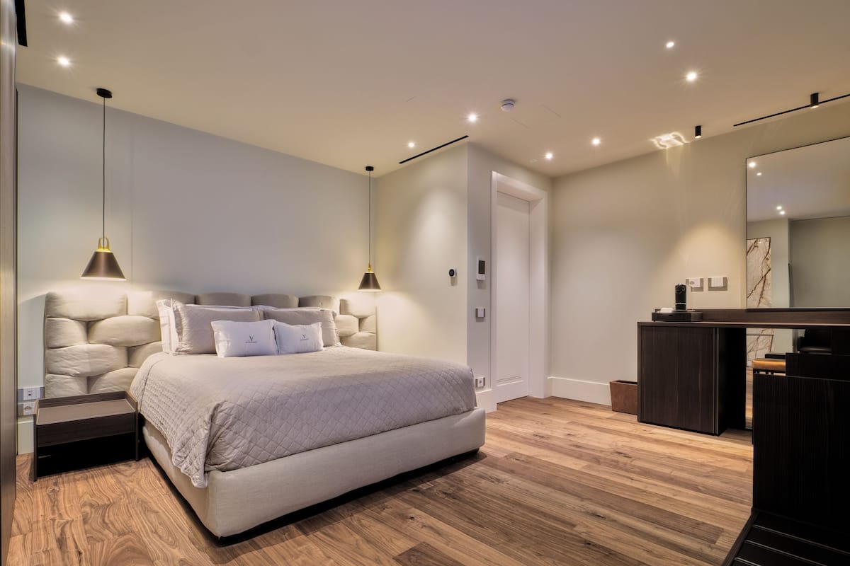 Premium bedding, down comforters, pillowtop beds, minibar