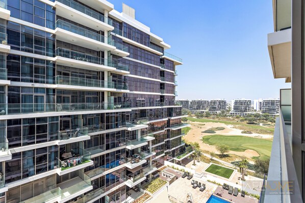 Balcony view - WelHome - Charming Breathtaking 1BR Apt. In Damac Hills (Dubai)