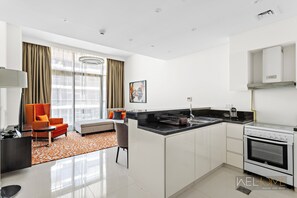 Private kitchen - WelHome - Charming Breathtaking 1BR Apt. In Damac Hills (Dubai)