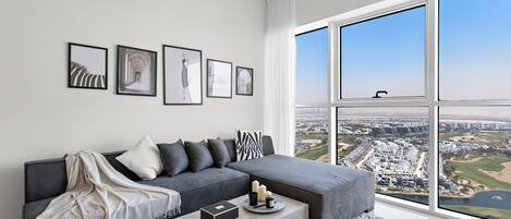 Deluxe Apartment, Balcony, City View | Living area | 50-inch Smart TV with cable channels