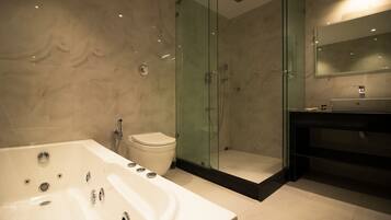 Shower, rainfall showerhead, towels, soap